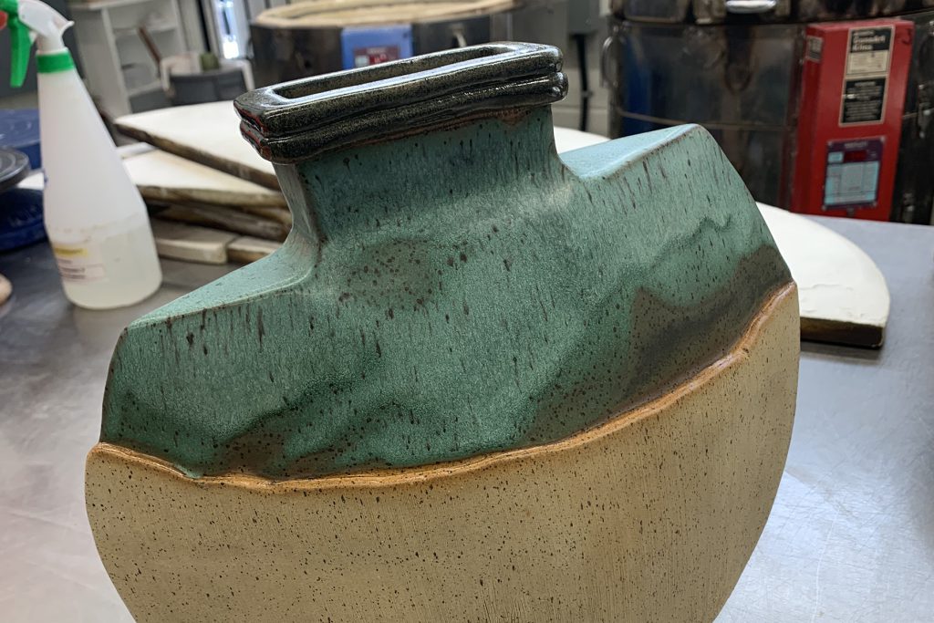 Décor vase, Bronze glaze on natural speckled clay.